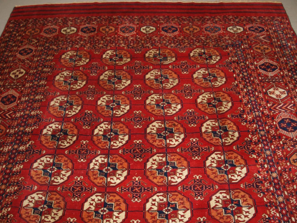 ANTIQUE TEKKE TURKMEN MAIN CARPET, UNUSUAL PILED ELEM END PANELS, 4TH QUARTER 19TH CENTURY. View IV