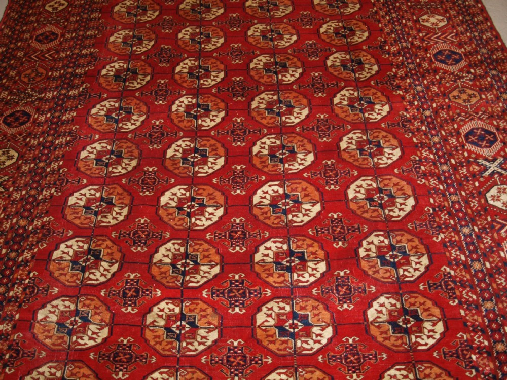 ANTIQUE TEKKE TURKMEN MAIN CARPET, UNUSUAL PILED ELEM END PANELS, 4TH QUARTER 19TH CENTURY. View V
