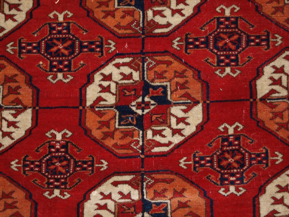 ANTIQUE TEKKE TURKMEN MAIN CARPET, UNUSUAL PILED ELEM END PANELS, 4TH QUARTER 19TH CENTURY. View VII