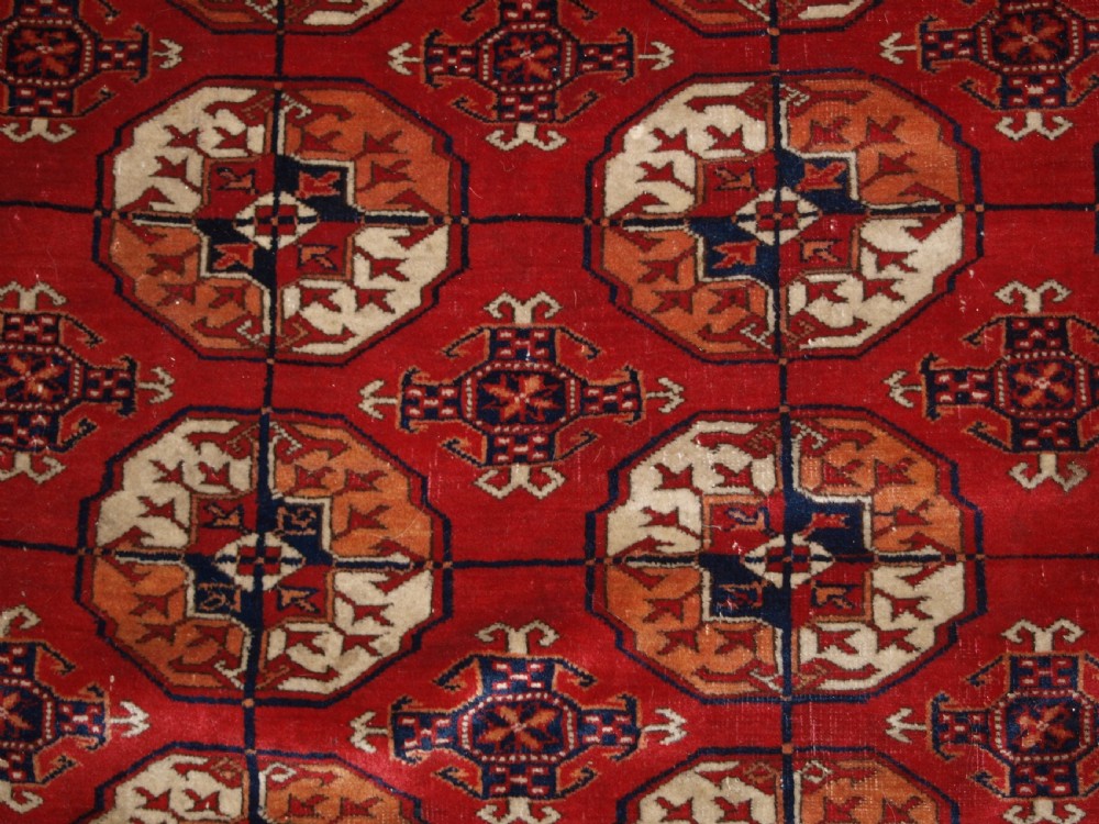 ANTIQUE TEKKE TURKMEN MAIN CARPET, UNUSUAL PILED ELEM END PANELS, 4TH QUARTER 19TH CENTURY. View VIII