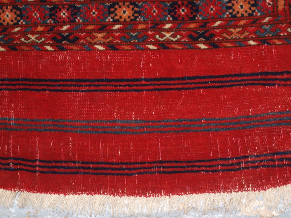 ANTIQUE TEKKE TURKMEN MAIN CARPET, UNUSUAL PILED ELEM END PANELS, 4TH QUARTER 19TH CENTURY. View IX