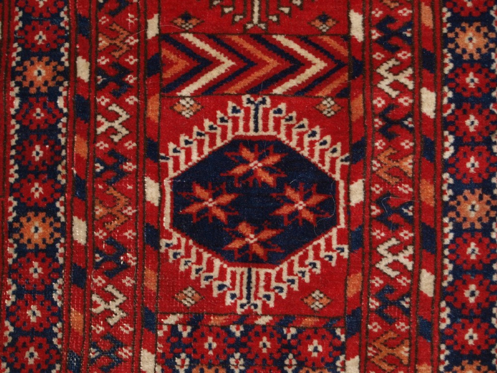 ANTIQUE TEKKE TURKMEN MAIN CARPET, UNUSUAL PILED ELEM END PANELS, 4TH QUARTER 19TH CENTURY. View X