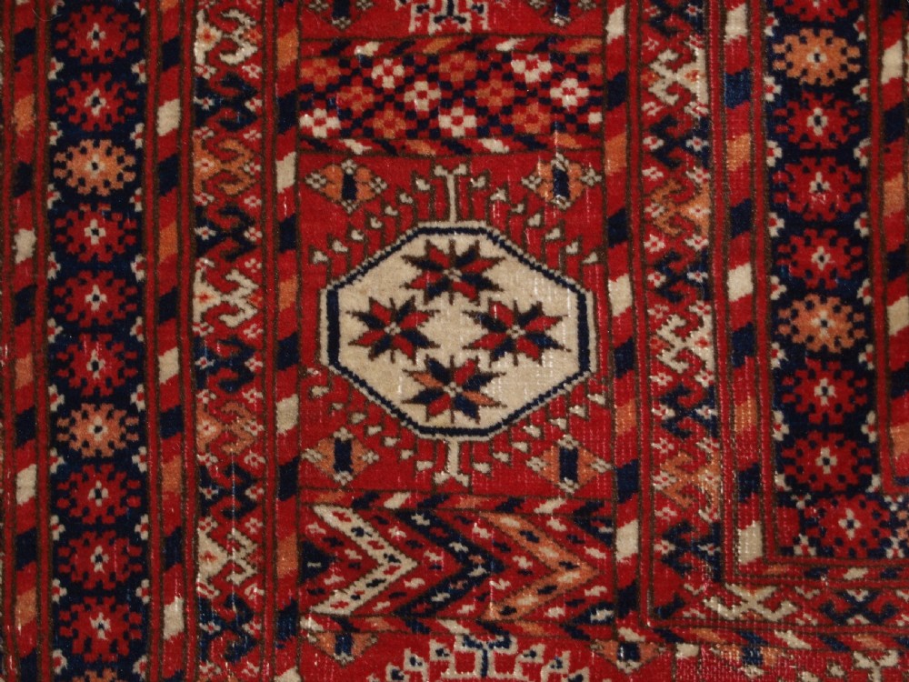 ANTIQUE TEKKE TURKMEN MAIN CARPET, UNUSUAL PILED ELEM END PANELS, 4TH QUARTER 19TH CENTURY. View XI