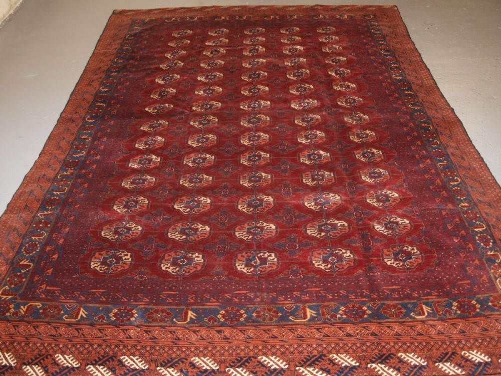 OLD AFGHAN VILLAGE CARPET WITH BESHIR TURKMEN BORDER DESIGN, CIRCA 1920. View II