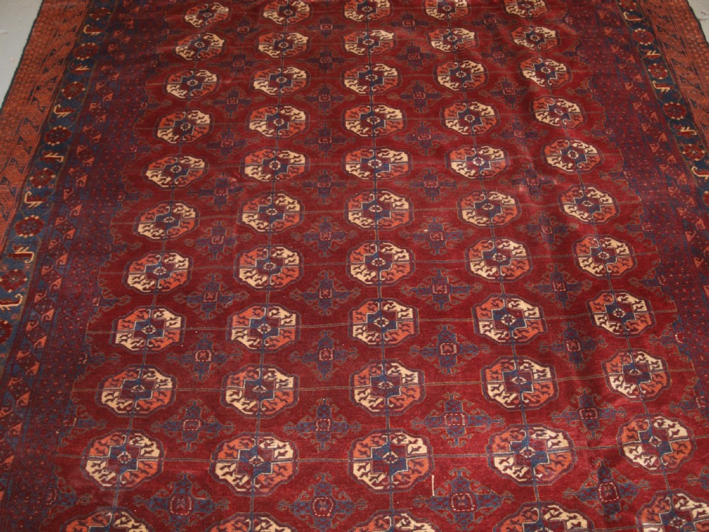 OLD AFGHAN VILLAGE CARPET WITH BESHIR TURKMEN BORDER DESIGN, CIRCA 1920. View VI