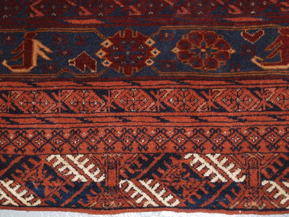 OLD AFGHAN VILLAGE CARPET WITH BESHIR TURKMEN BORDER DESIGN, CIRCA 1920. View X