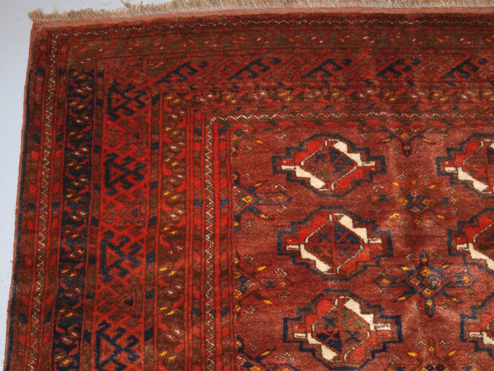 OLD AFGHAN VILLAGE CARPET, ERSARI WEAVERS, CHUVAL GUL DESIGN, CIRCA 1920. View III