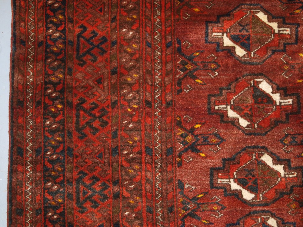 OLD AFGHAN VILLAGE CARPET, ERSARI WEAVERS, CHUVAL GUL DESIGN, CIRCA 1920. View IV
