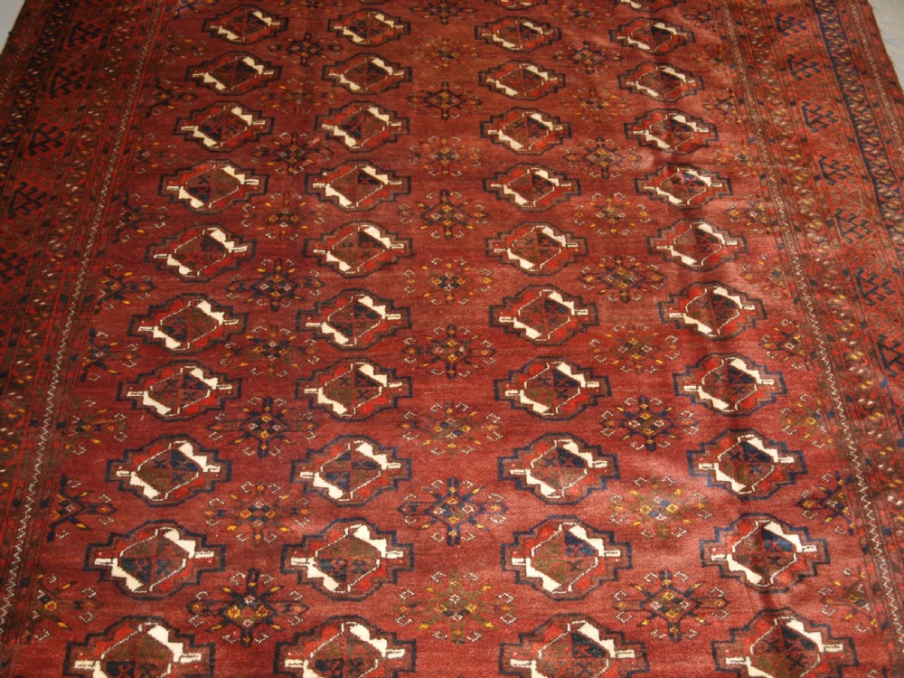 OLD AFGHAN VILLAGE CARPET, ERSARI WEAVERS, CHUVAL GUL DESIGN, CIRCA 1920. View VI