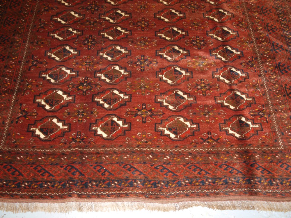 OLD AFGHAN VILLAGE CARPET, ERSARI WEAVERS, CHUVAL GUL DESIGN, CIRCA 1920. View VIII