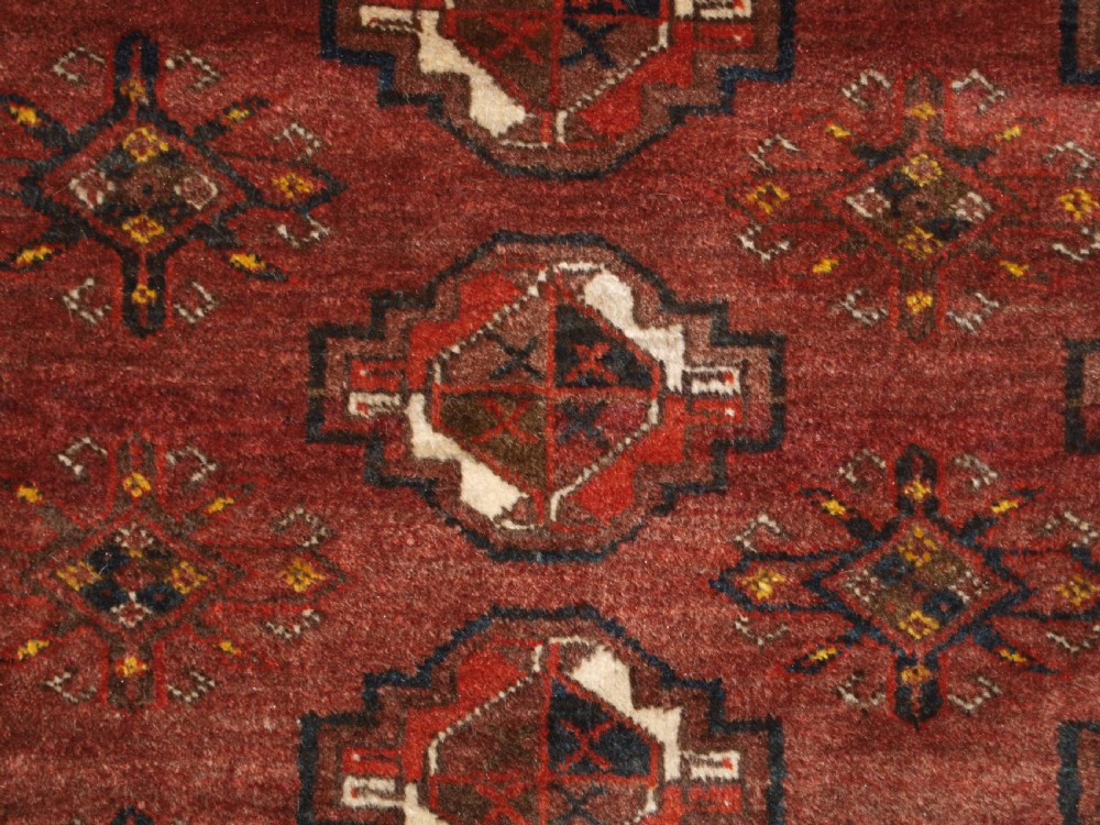 OLD AFGHAN VILLAGE CARPET, ERSARI WEAVERS, CHUVAL GUL DESIGN, CIRCA 1920. View IX