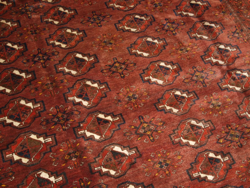 OLD AFGHAN VILLAGE CARPET, ERSARI WEAVERS, CHUVAL GUL DESIGN, CIRCA 1920. View XII