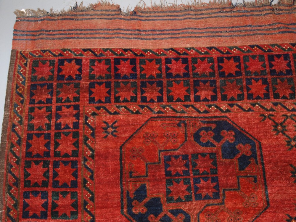 ANTIQUE AFGHAN ERSARI TURKMEN MAIN CARPET OF OUTSTANDING DESIGN AND COLOUR, 2ND HALF 19TH CENTURY. View III