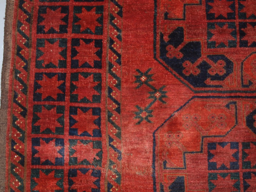 ANTIQUE AFGHAN ERSARI TURKMEN MAIN CARPET OF OUTSTANDING DESIGN AND COLOUR, 2ND HALF 19TH CENTURY. View IV