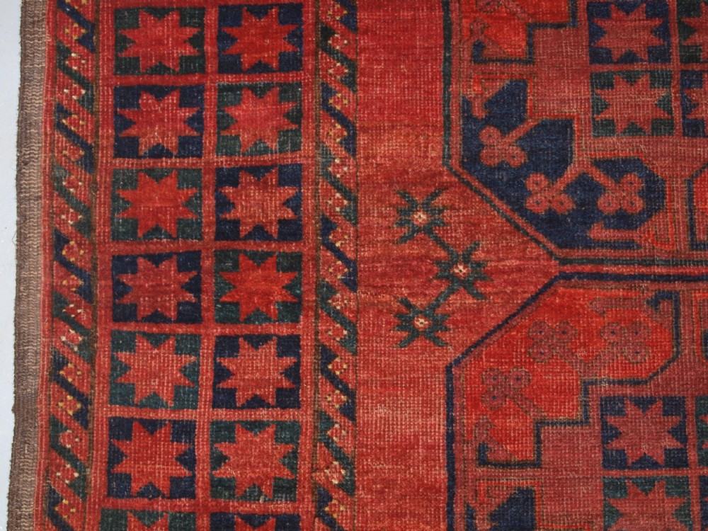 ANTIQUE AFGHAN ERSARI TURKMEN MAIN CARPET OF OUTSTANDING DESIGN AND COLOUR, 2ND HALF 19TH CENTURY. View V