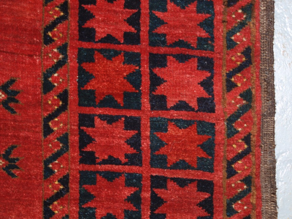 ANTIQUE AFGHAN ERSARI TURKMEN MAIN CARPET OF OUTSTANDING DESIGN AND COLOUR, 2ND HALF 19TH CENTURY. View VIII