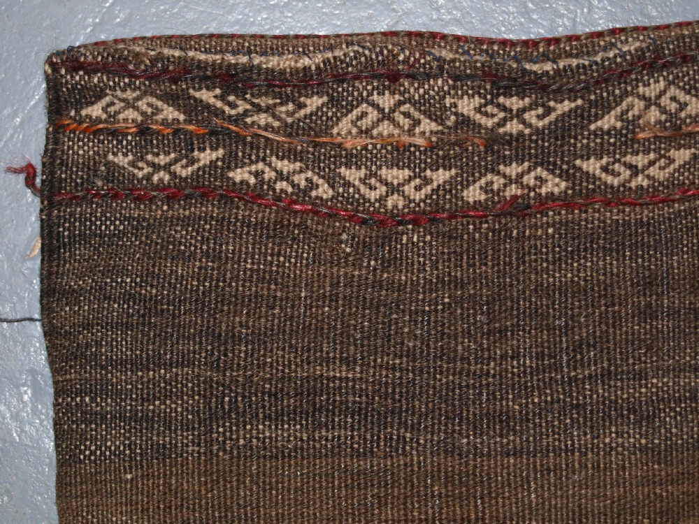 OLD AFGHAN BALUCH SADDLE BAG OF TRADITIONAL DESIGN WITH PLAIN WEAVE BACK, CIRCA 1920. View VII