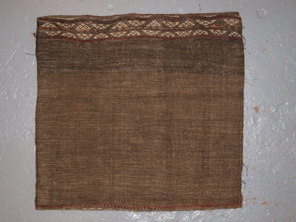 OLD AFGHAN BALUCH SADDLE BAG OF TRADITIONAL DESIGN WITH PLAIN WEAVE BACK, CIRCA 1920. View VIII