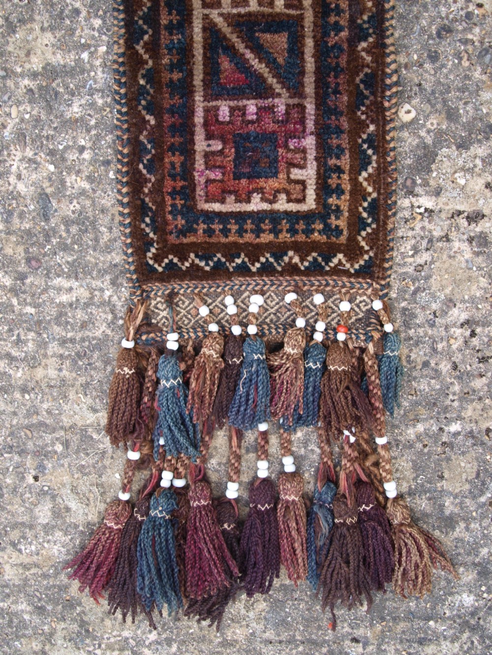 OLD AFGHAN BALUCH CAMEL TRAPPING WITH TASSELS AND BEADS, CIRCA 1920. View II