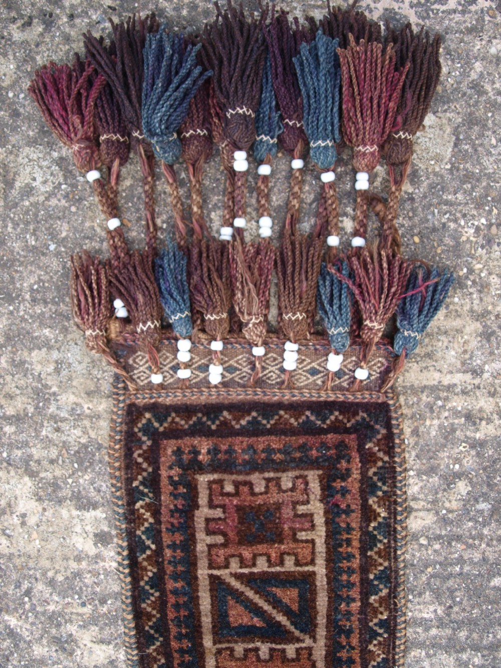 OLD AFGHAN BALUCH CAMEL TRAPPING WITH TASSELS AND BEADS, CIRCA 1920. View IV