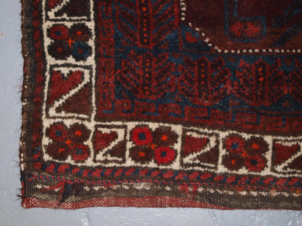 ANTIQUE AFGHAN BALUCH SADDLE BAG WITH PLAIN WEAVE BACK, CIRCA 1900. View III