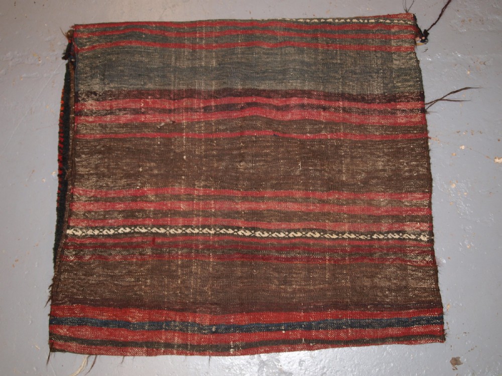 ANTIQUE AFGHAN BALUCH SADDLE BAG WITH PLAIN WEAVE BACK, CIRCA 1900. View V