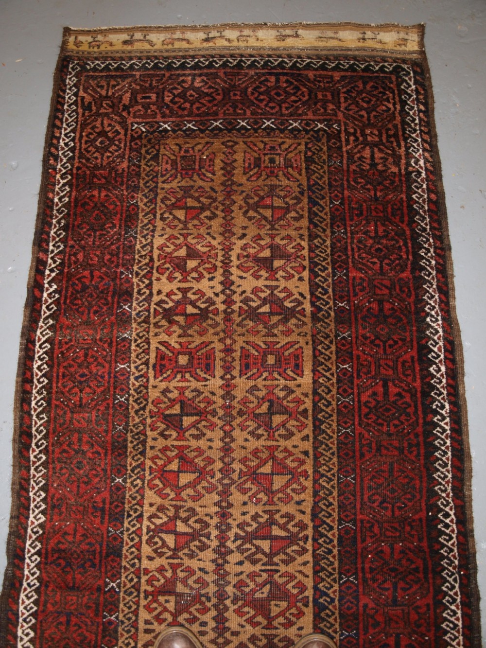 ANTIQUE BALUCH RUNNER, CAMEL GROUND WITH BIRDS AT EACH END. CIRCA 1900. View II