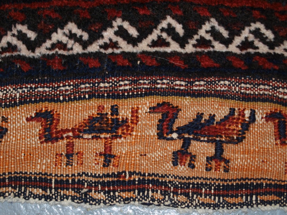 ANTIQUE BALUCH RUNNER, CAMEL GROUND WITH BIRDS AT EACH END. CIRCA 1900. View V