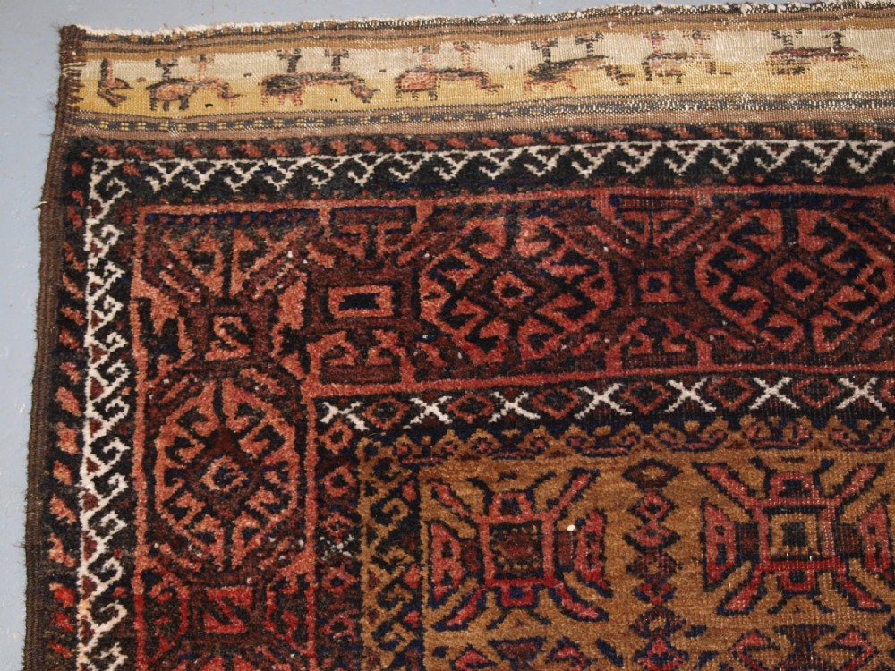 ANTIQUE BALUCH RUNNER, CAMEL GROUND WITH BIRDS AT EACH END. CIRCA 1900. View VI