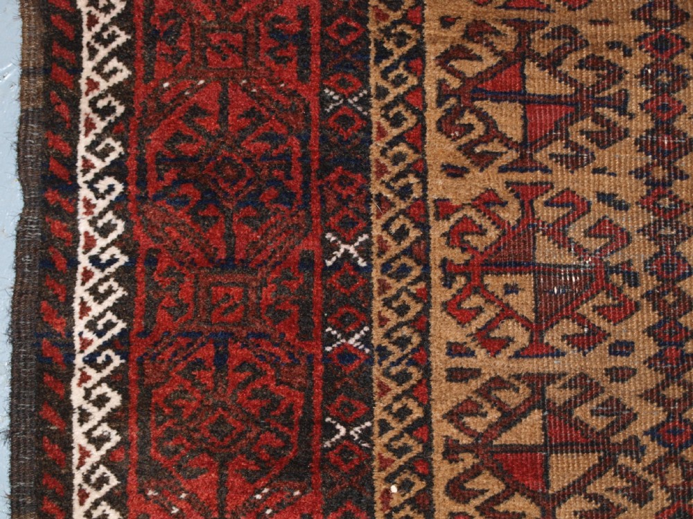 ANTIQUE BALUCH RUNNER, CAMEL GROUND WITH BIRDS AT EACH END. CIRCA 1900. View VII