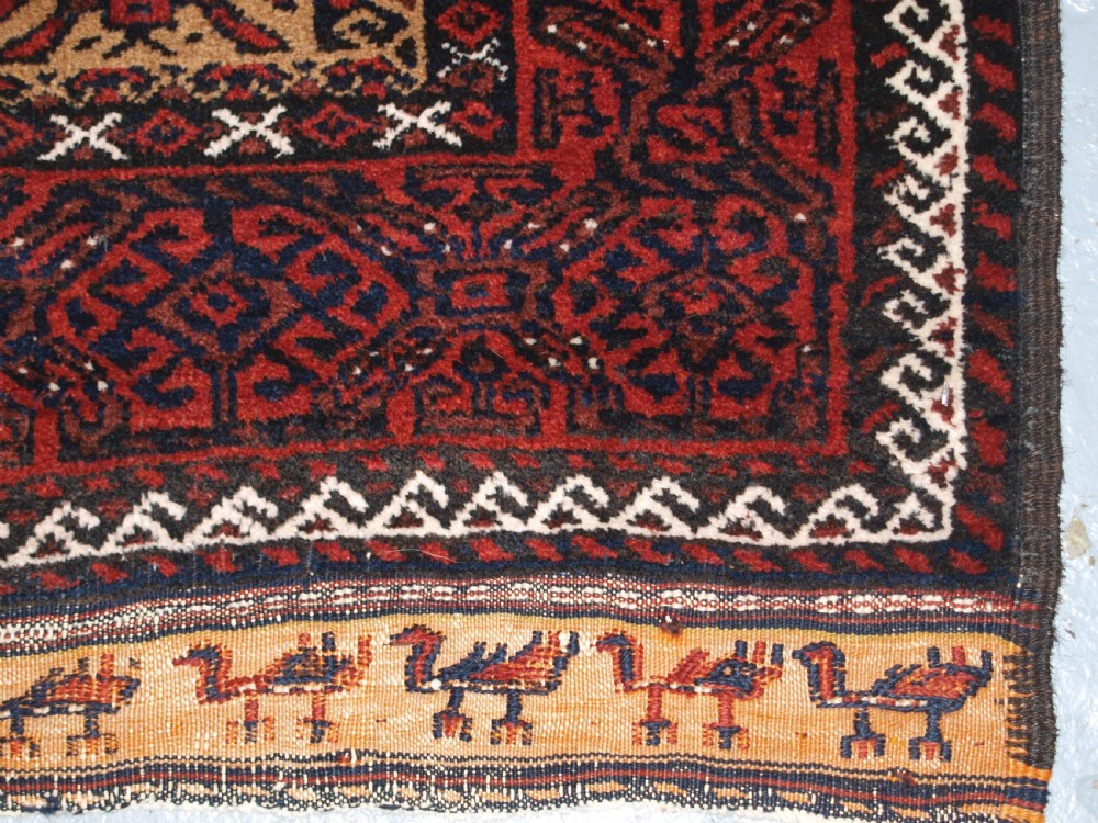 ANTIQUE BALUCH RUNNER, CAMEL GROUND WITH BIRDS AT EACH END. CIRCA 1900. View VIII