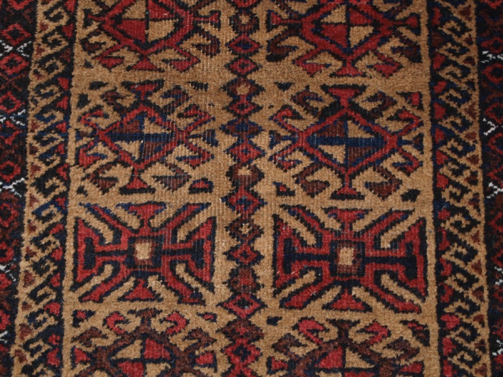 ANTIQUE BALUCH RUNNER, CAMEL GROUND WITH BIRDS AT EACH END. CIRCA 1900. View IX