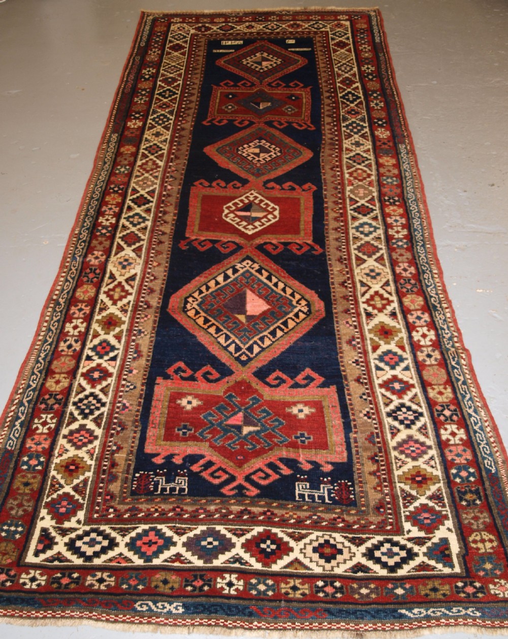 ANTIQUE CAUCASIAN KAZAK LONG RUG OR RUNNER, GREAT CONDITION AND COLOUR, LATE 19TH CENTURY.