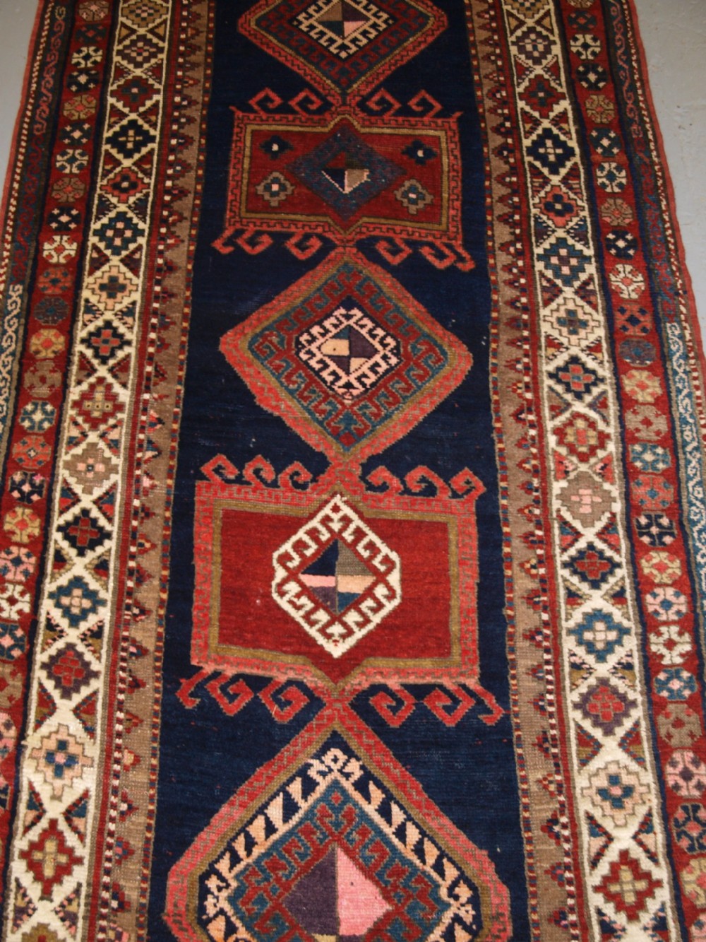 ANTIQUE CAUCASIAN KAZAK LONG RUG OR RUNNER, GREAT CONDITION AND COLOUR, LATE 19TH CENTURY. View III
