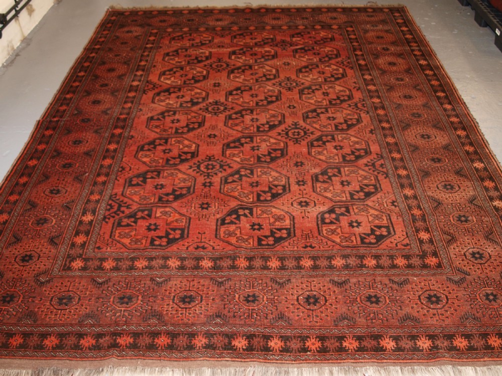 OLD AFGHAN VILLAGE CARPET OF TRADITIONAL DESIGN, SOFT BURNT ORANGE COLOUR, CIRCA 1920. View II