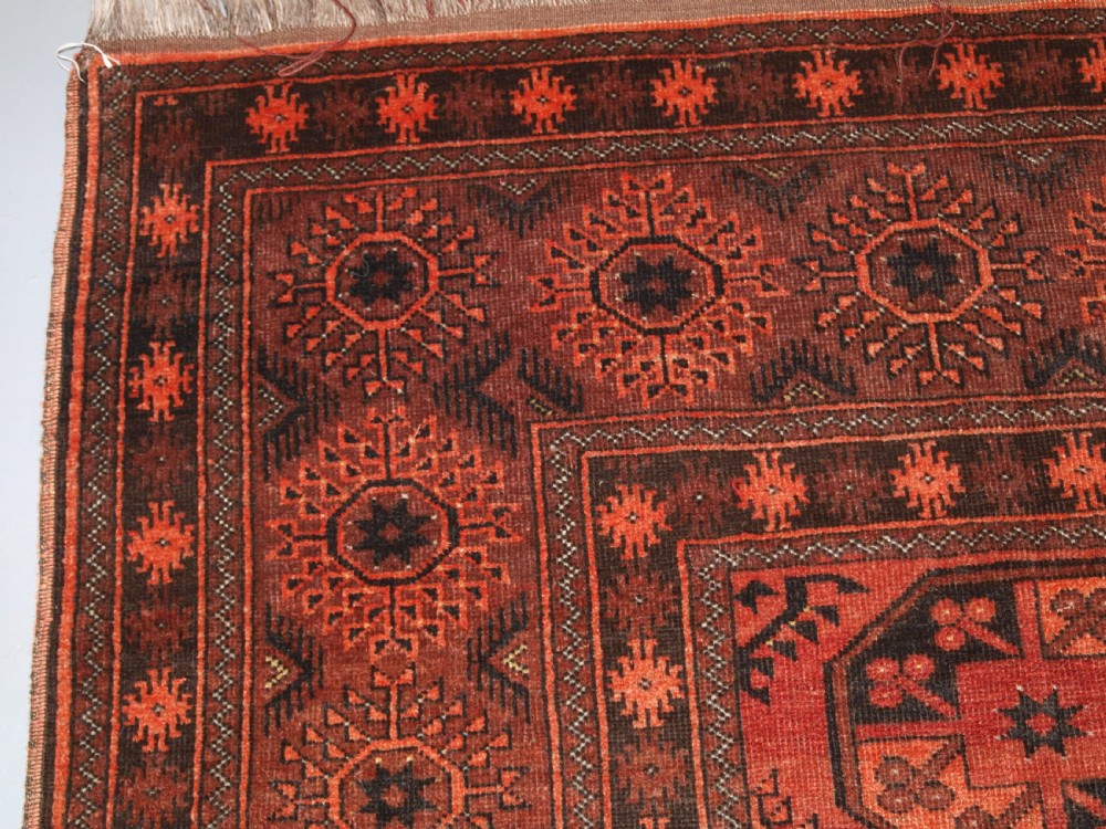 OLD AFGHAN VILLAGE CARPET OF TRADITIONAL DESIGN, SOFT BURNT ORANGE COLOUR, CIRCA 1920. View III