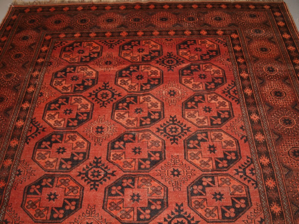 OLD AFGHAN VILLAGE CARPET OF TRADITIONAL DESIGN, SOFT BURNT ORANGE COLOUR, CIRCA 1920. View V