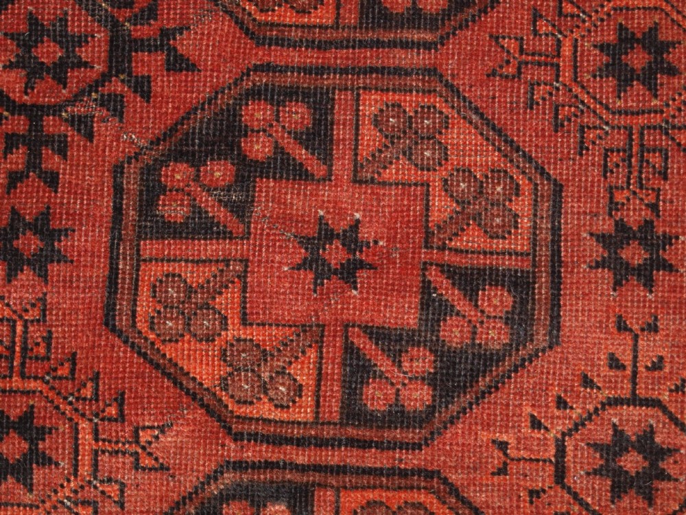OLD AFGHAN VILLAGE CARPET OF TRADITIONAL DESIGN, SOFT BURNT ORANGE COLOUR, CIRCA 1920. View X