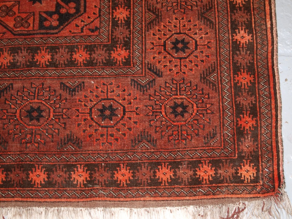 OLD AFGHAN VILLAGE CARPET OF TRADITIONAL DESIGN, SOFT BURNT ORANGE COLOUR, CIRCA 1920. View XI