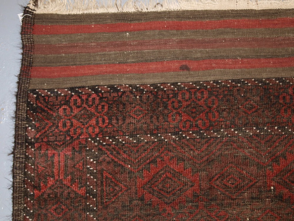 ANTIQUE AFGHAN BALUCH RUG, HEAVY WEAR, GOOD LIVED WITH LOOK, CIRCA 1900. View II