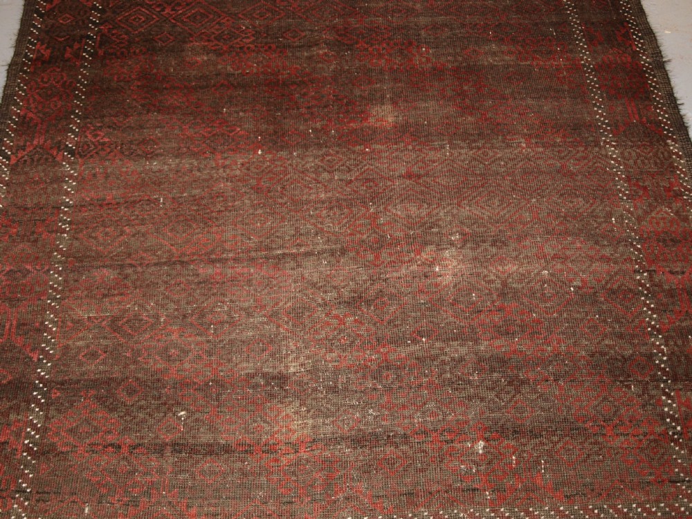 ANTIQUE AFGHAN BALUCH RUG, HEAVY WEAR, GOOD LIVED WITH LOOK, CIRCA 1900. View VI