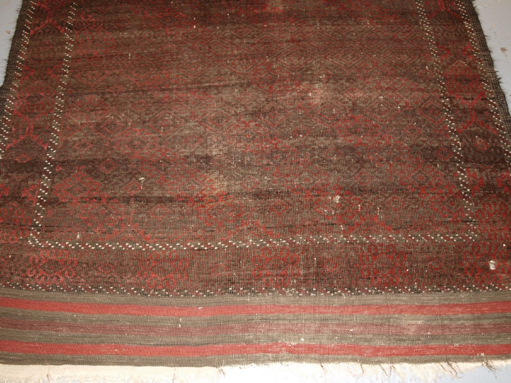 ANTIQUE AFGHAN BALUCH RUG, HEAVY WEAR, GOOD LIVED WITH LOOK, CIRCA 1900. View VII