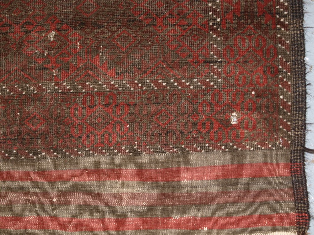 ANTIQUE AFGHAN BALUCH RUG, HEAVY WEAR, GOOD LIVED WITH LOOK, CIRCA 1900. View VIII