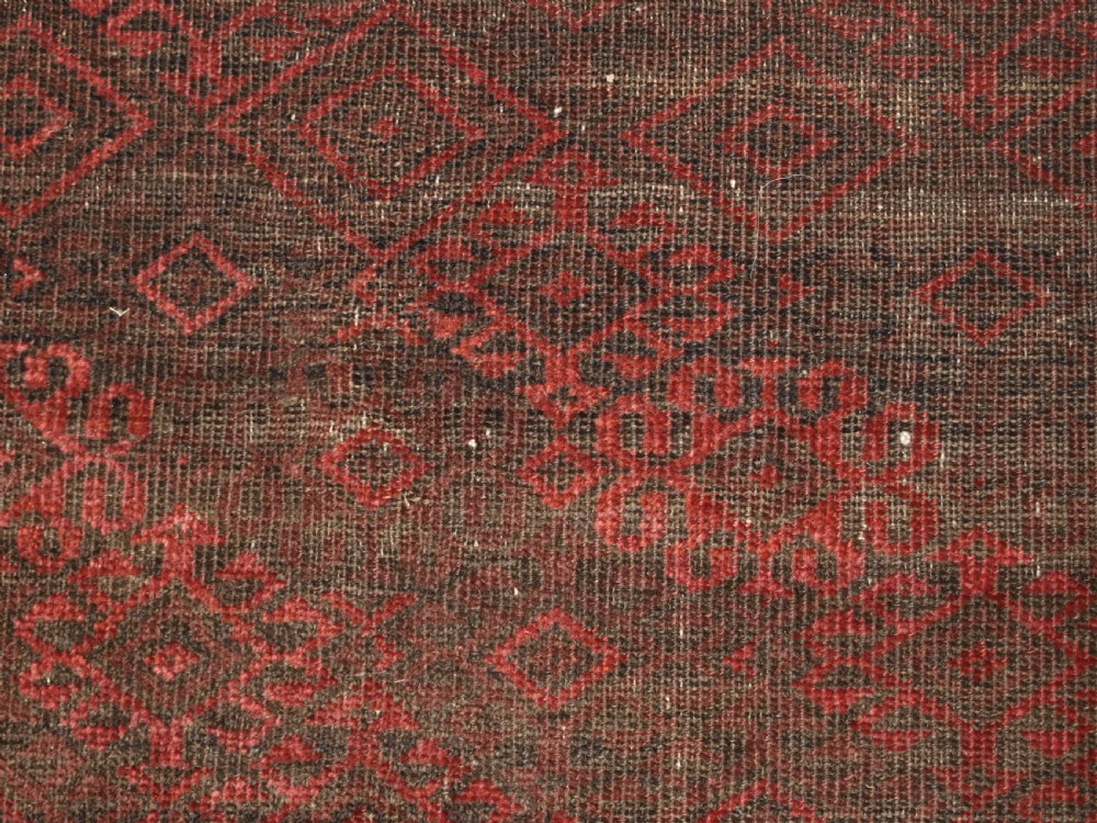 ANTIQUE AFGHAN BALUCH RUG, HEAVY WEAR, GOOD LIVED WITH LOOK, CIRCA 1900. View IX