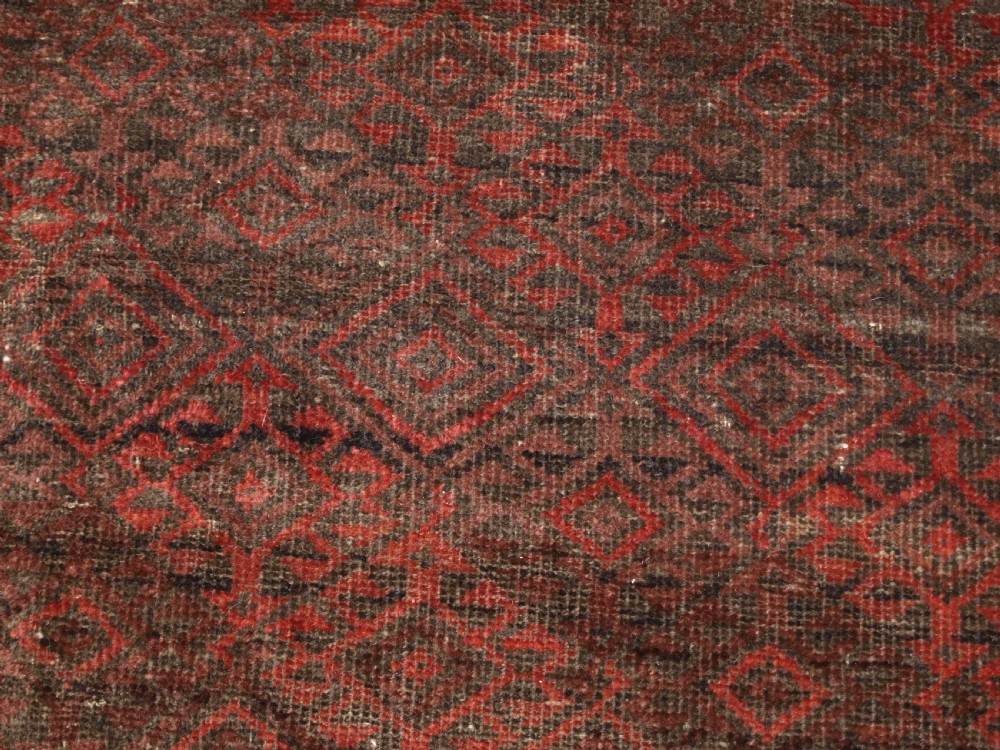 ANTIQUE AFGHAN BALUCH RUG, HEAVY WEAR, GOOD LIVED WITH LOOK, CIRCA 1900. View X