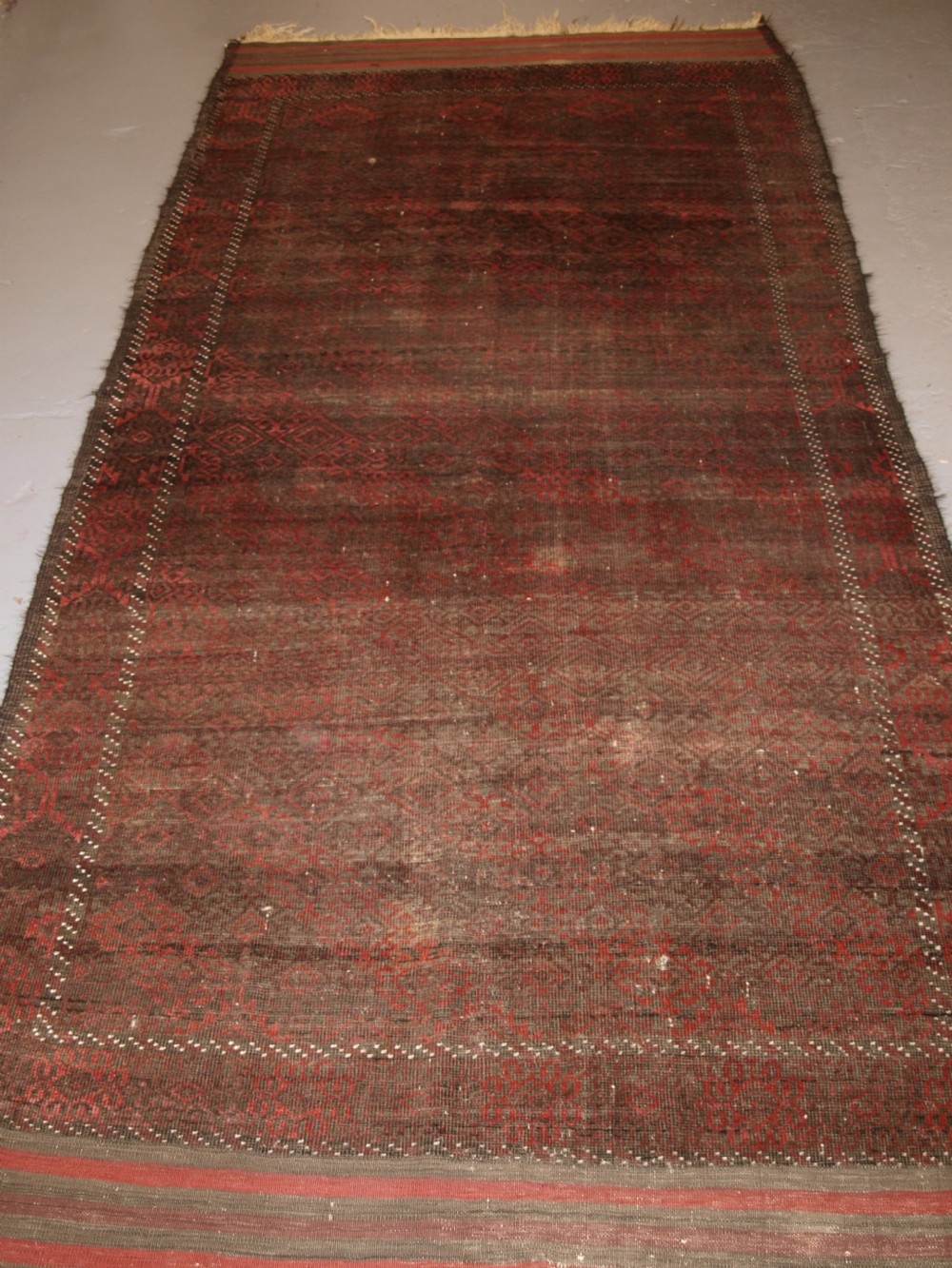 ANTIQUE AFGHAN BALUCH RUG, HEAVY WEAR, GOOD LIVED WITH LOOK, CIRCA 1900. View XII