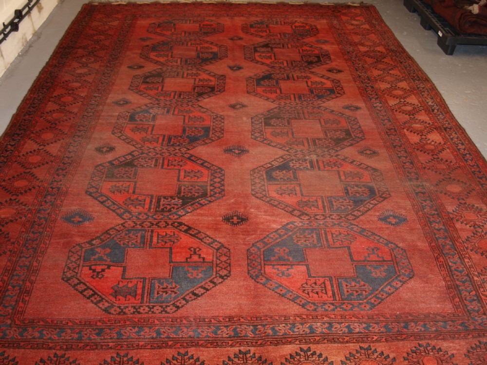 ANTIQUE AFGHAN SULAYMAN CARPET, HEAVY WEAR BUT STILL SOUND, CIRCA 1900. View II