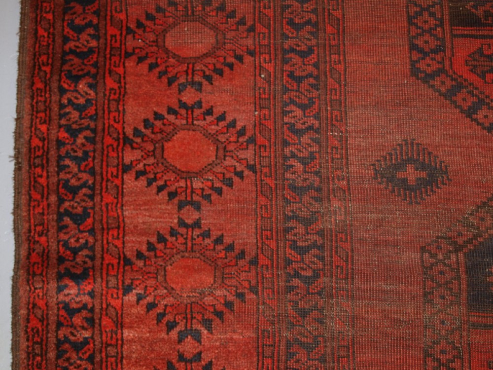 ANTIQUE AFGHAN SULAYMAN CARPET, HEAVY WEAR BUT STILL SOUND, CIRCA 1900. View IV