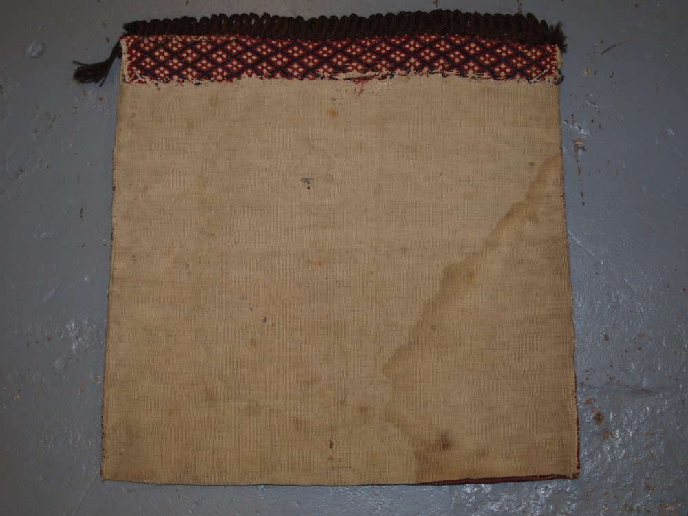 ANTIQUE TEKKE TURKMEN SADDLE BAG IN BANDED MIXED TECHNIQUE, PLAIN WEAVE BACK, CIRCA 1900/20. View VII