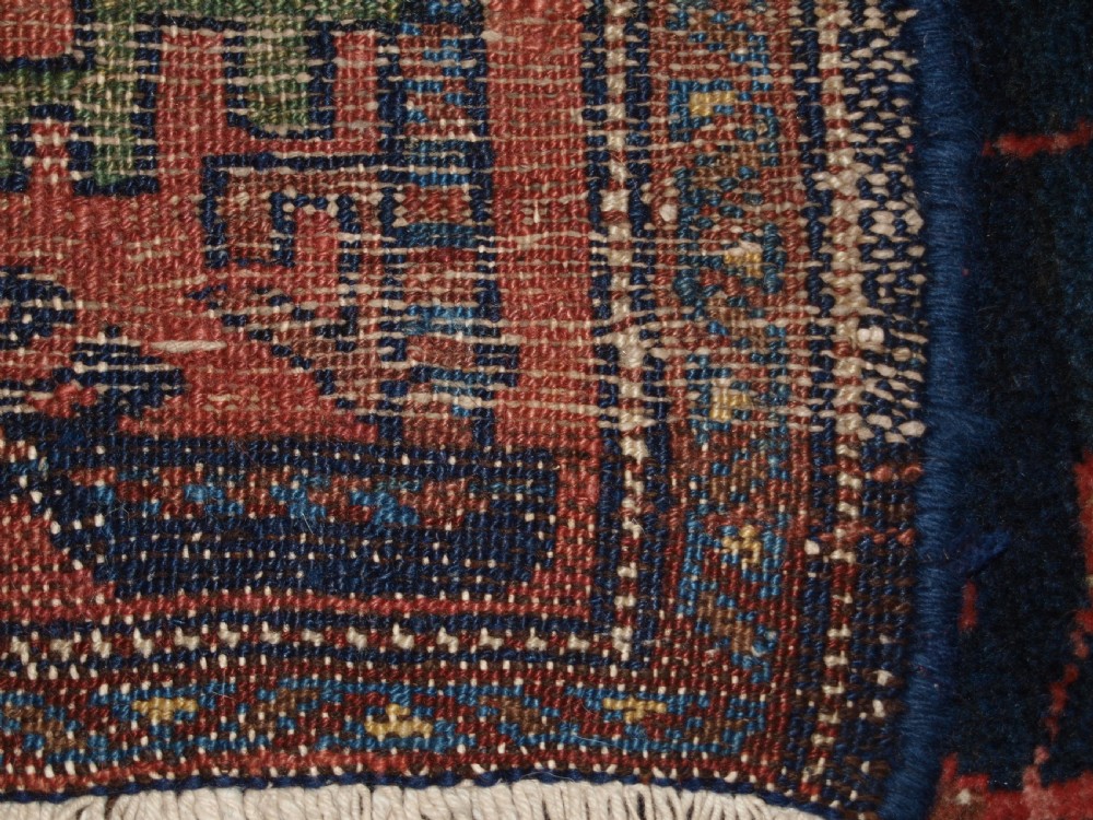 OLD NORTH WEST PERSIAN HAMADAN VILLAGE RUG WITH UNUSUAL DESIGN, BALUCH BORDER, CIRCA 1920. View X